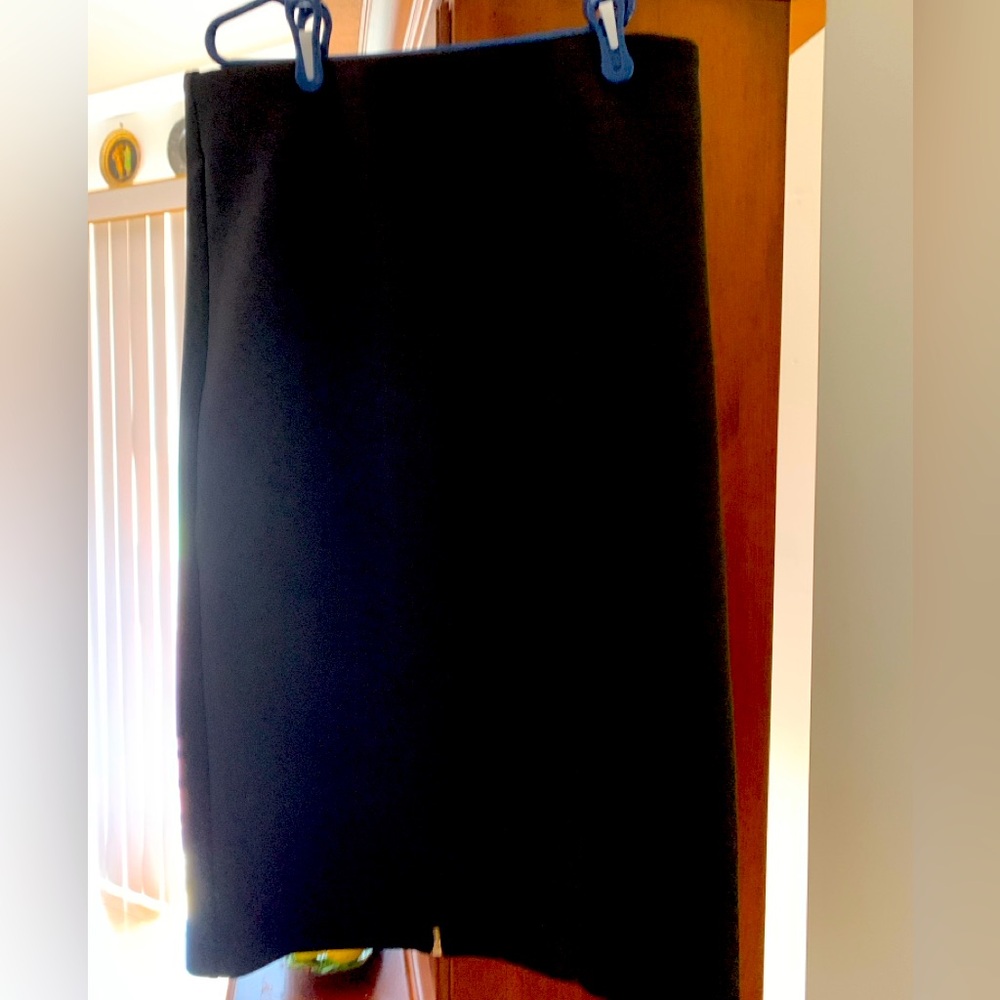 Below the knee black skirt. Size 10. Great condition!